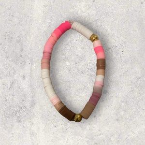 Pink clay bead bracelet with gold balls